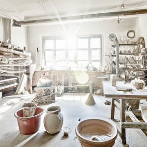 A hyper-realistic, wide-angle interior shot of a sun-dren...