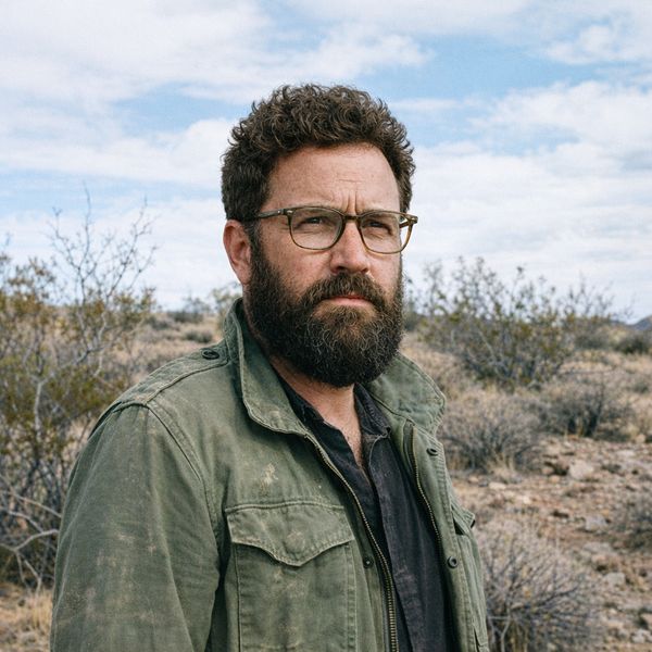 AI image generated by GPT Image 1.5, ranked #11 of 15 in the "Bald man challenge" arena challenge — prompt: Give the person a full, thick head of natural hair with realistic texture, density, and a natural hairline. Preserve facial features and lighting.