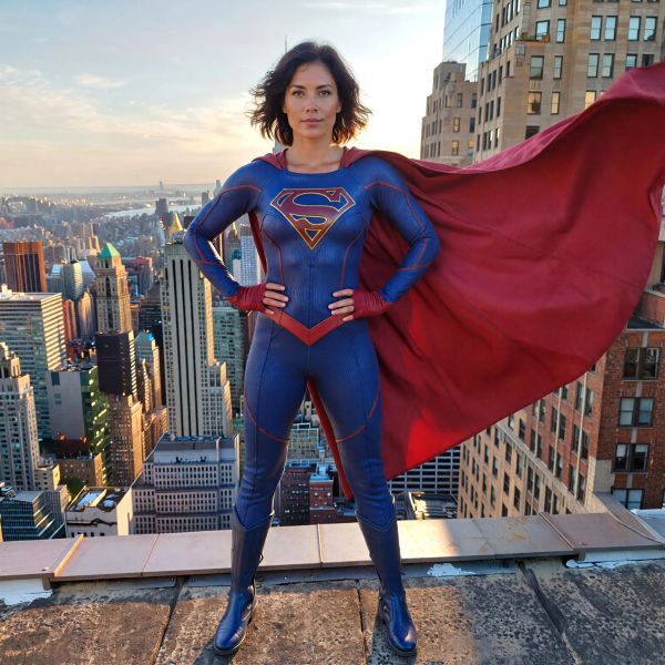 Hyper-photorealistic full-body portrait of a female superhero standing triumphantly on a New York...
