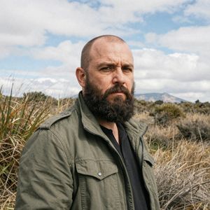 Give the person a full, thick head of natural hair with r...