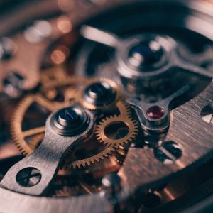 A close-up studio photograph of an intricate, vintage mec...