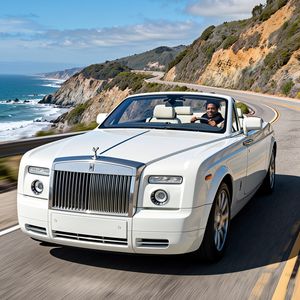 Make a photo of the man driving the car down the Californ...