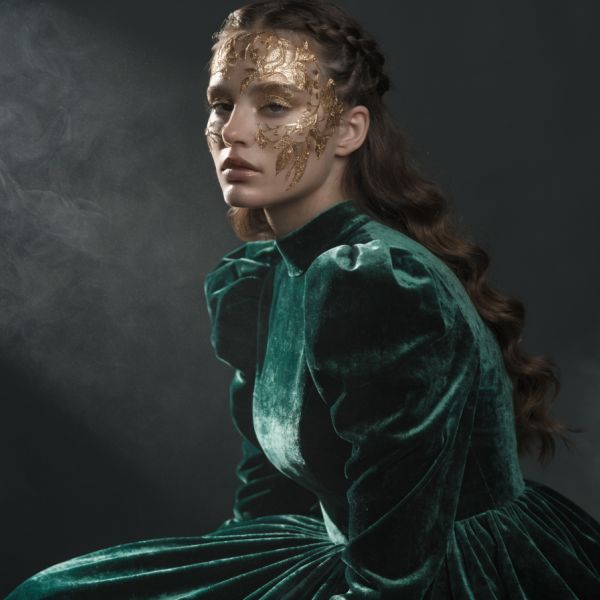 A hyper-realistic studio portrait of a young woman with intricate botanical patterns painted on h...