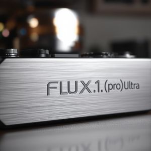 A wide, cinematic low-angle shot of a premium, brushed al...