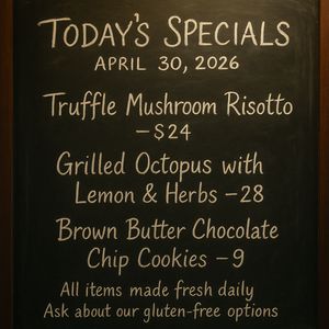 Handwritten-style chalkboard menu in a cozy café, all tex...